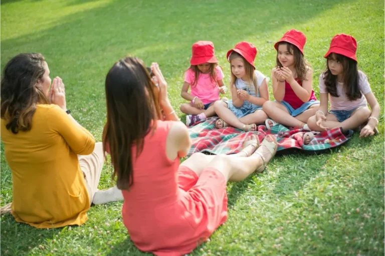 Picture of women playing with kids